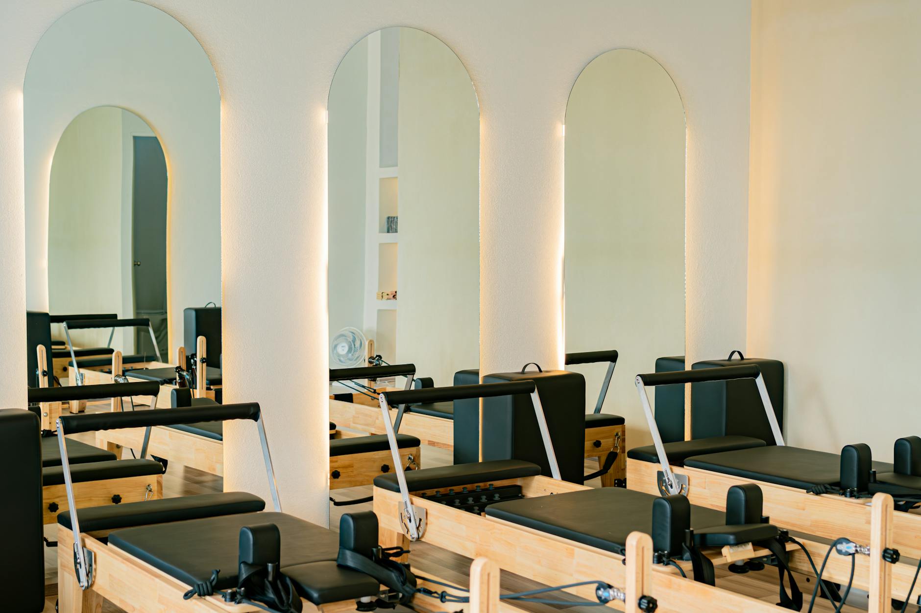 well-lit room with natural light and mirrors