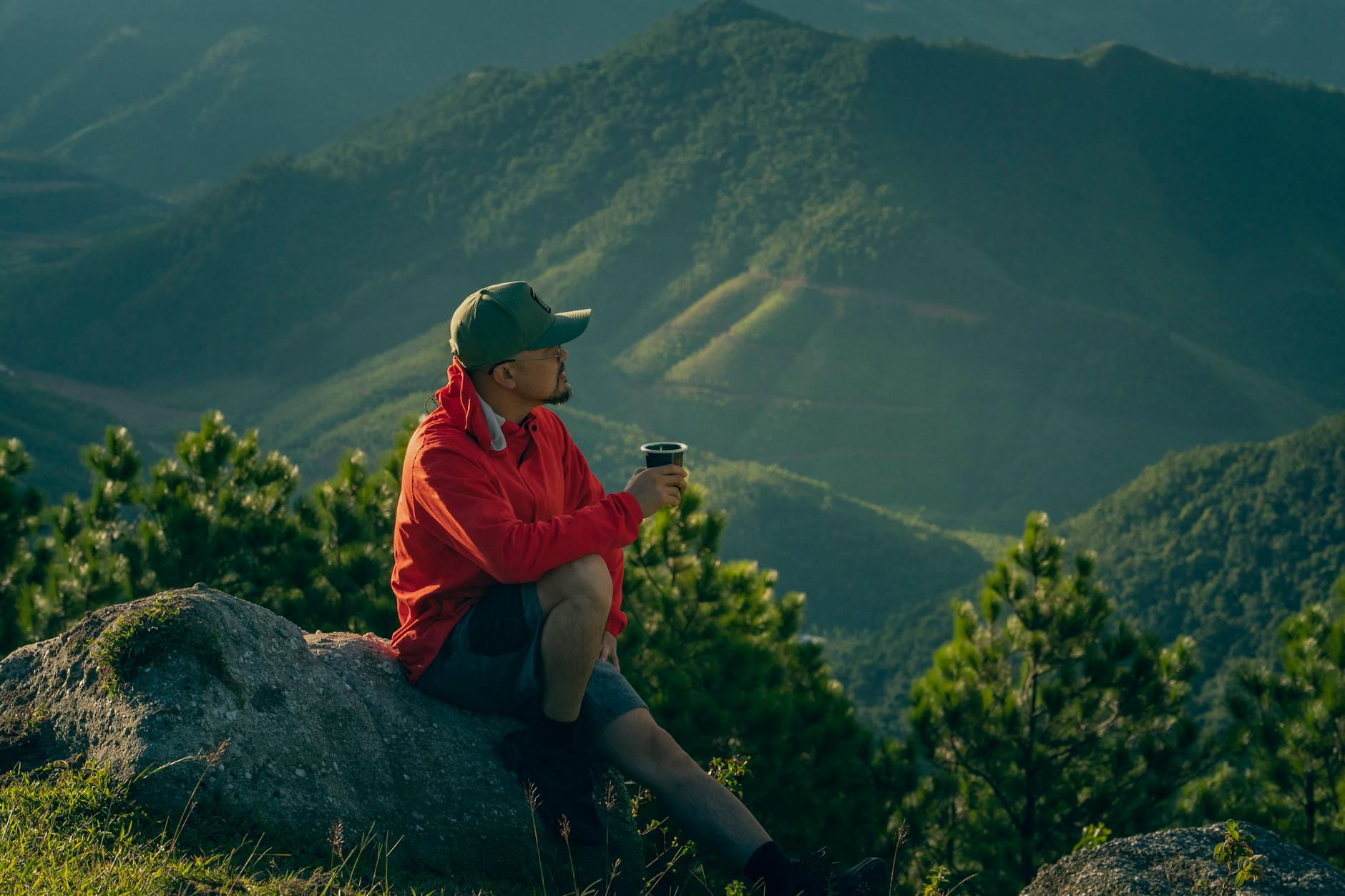 hiker enjoying nature on mountaintop