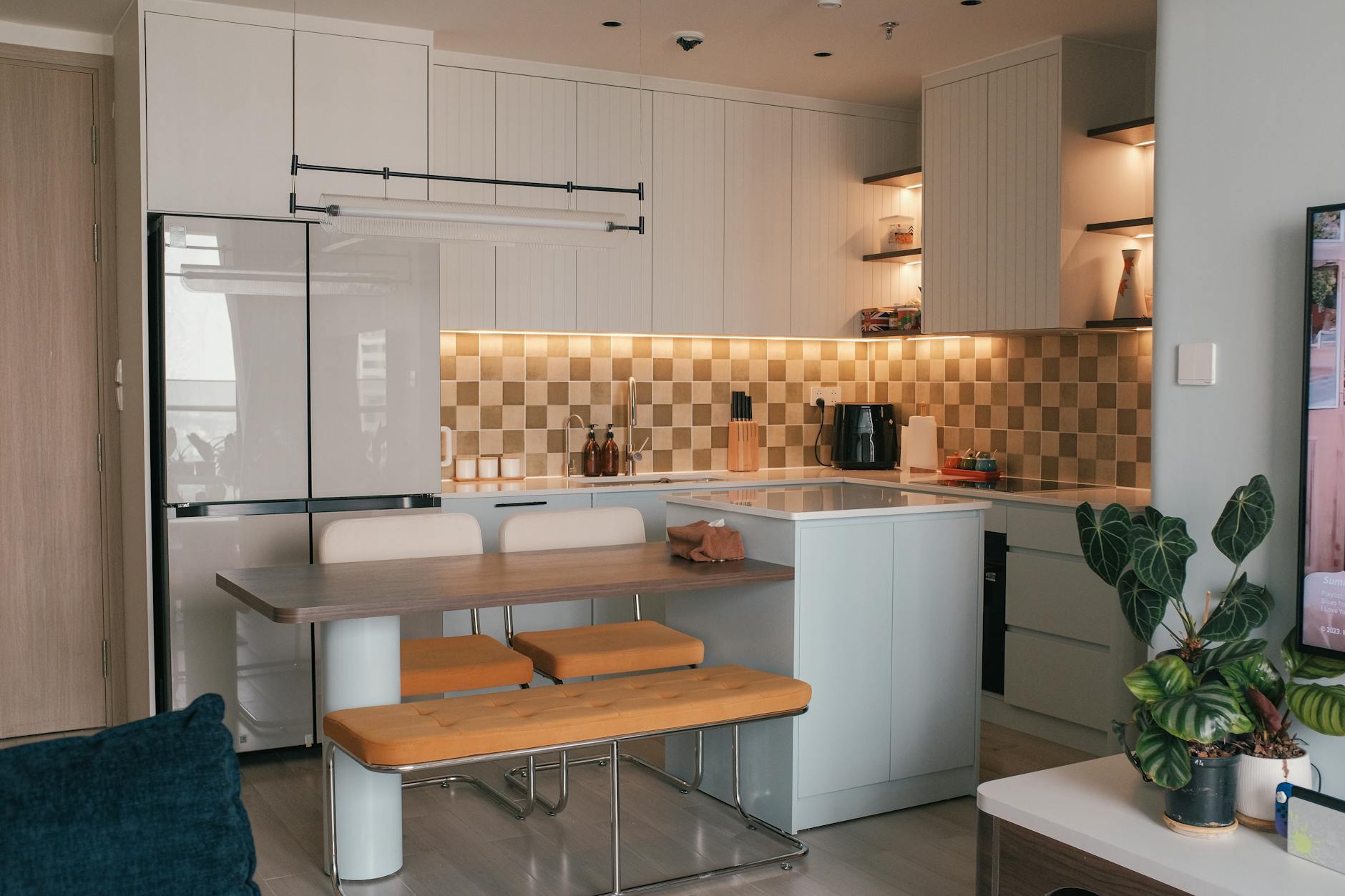 bright open kitchen with natural light and plants