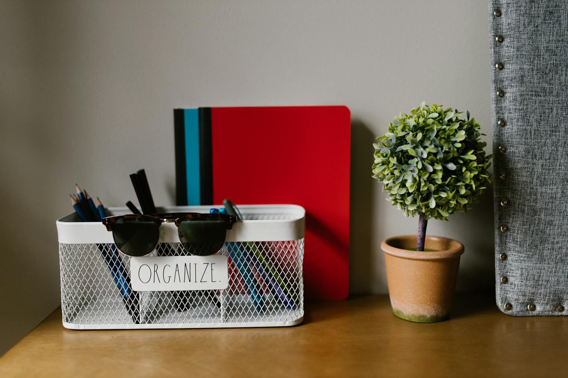 cleaning supplies organized in a basket