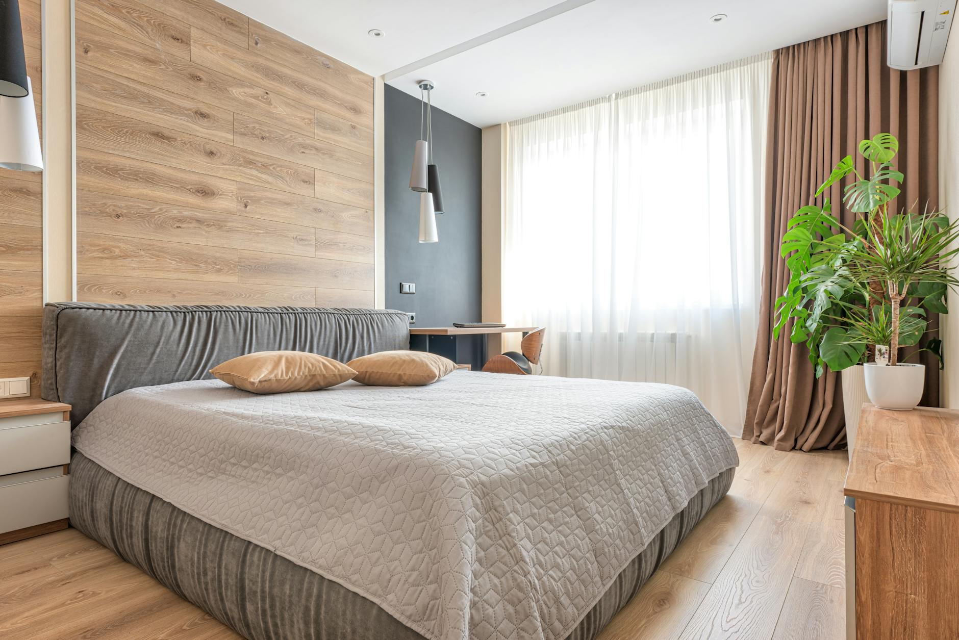 bright bedroom with plants and natural light