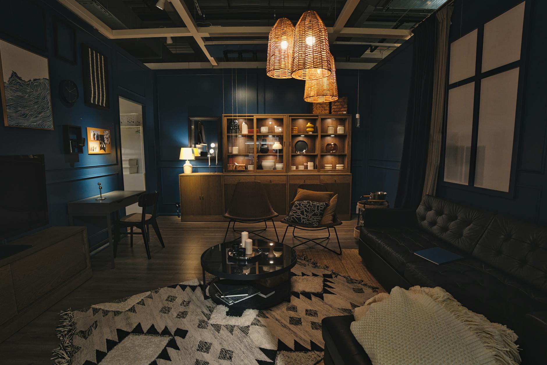 warm lighting in cozy living room with lamps and candles