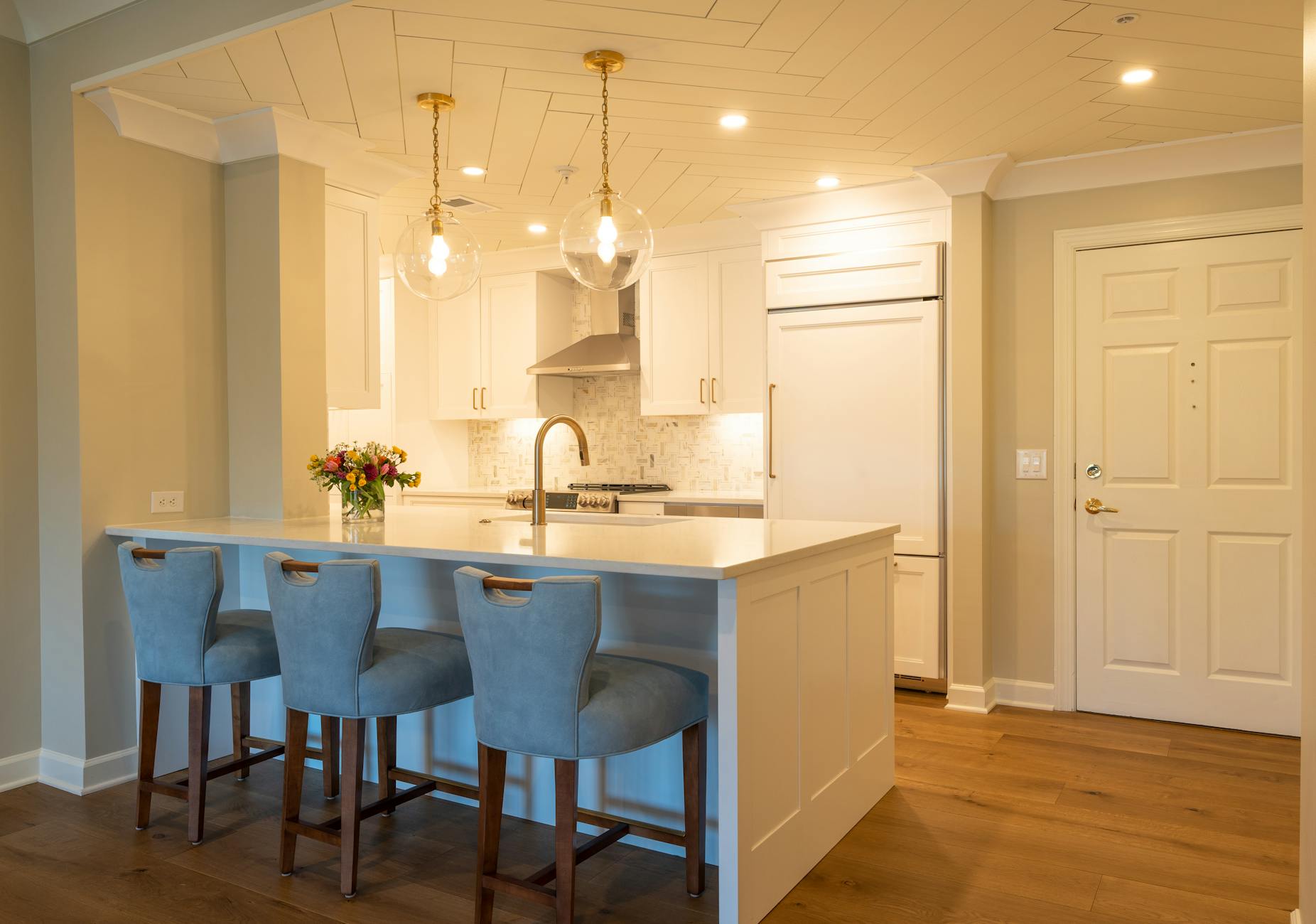 open concept kitchen with island and seating