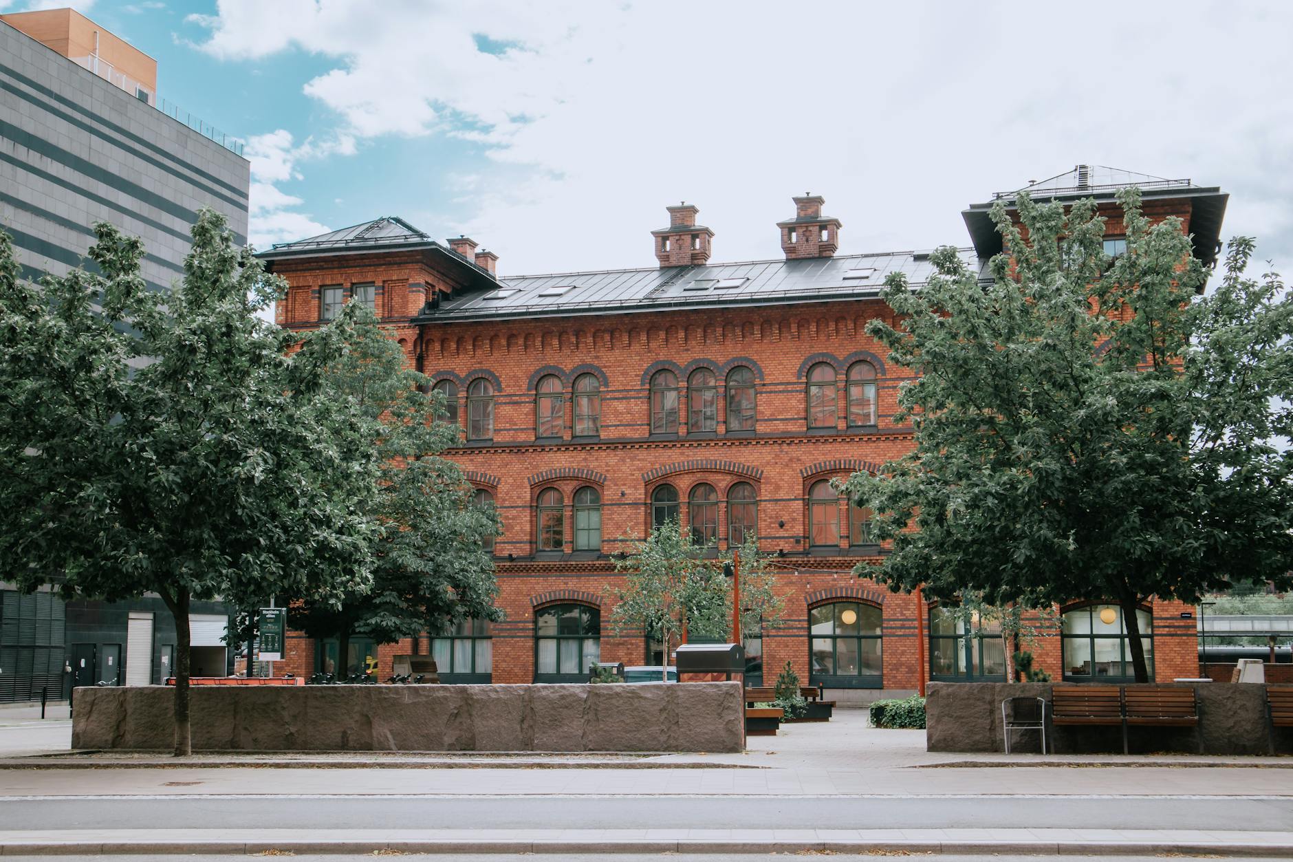 beautiful street in a city with trees and historic buildings