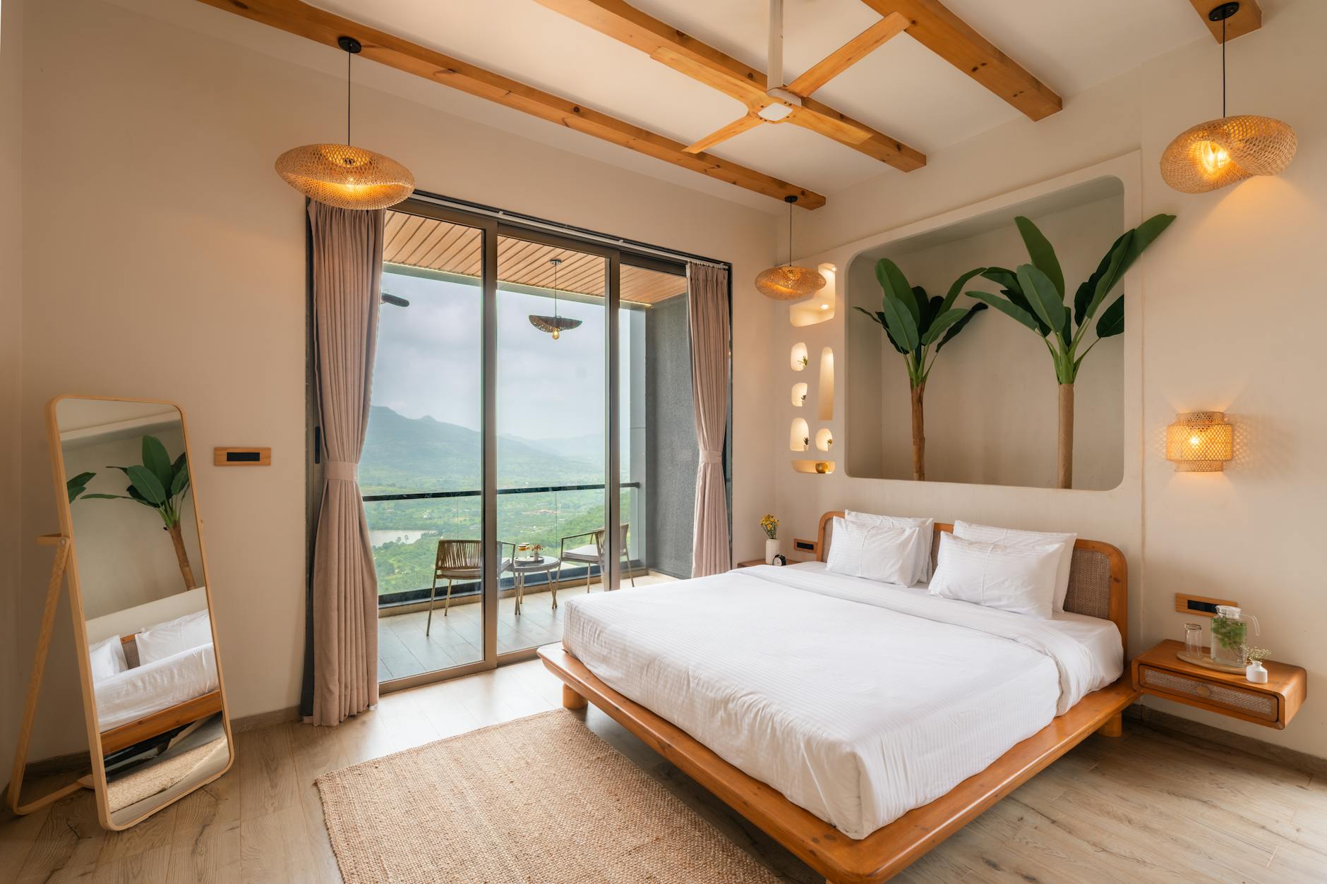 luxury bedroom with indoor plants and natural materials