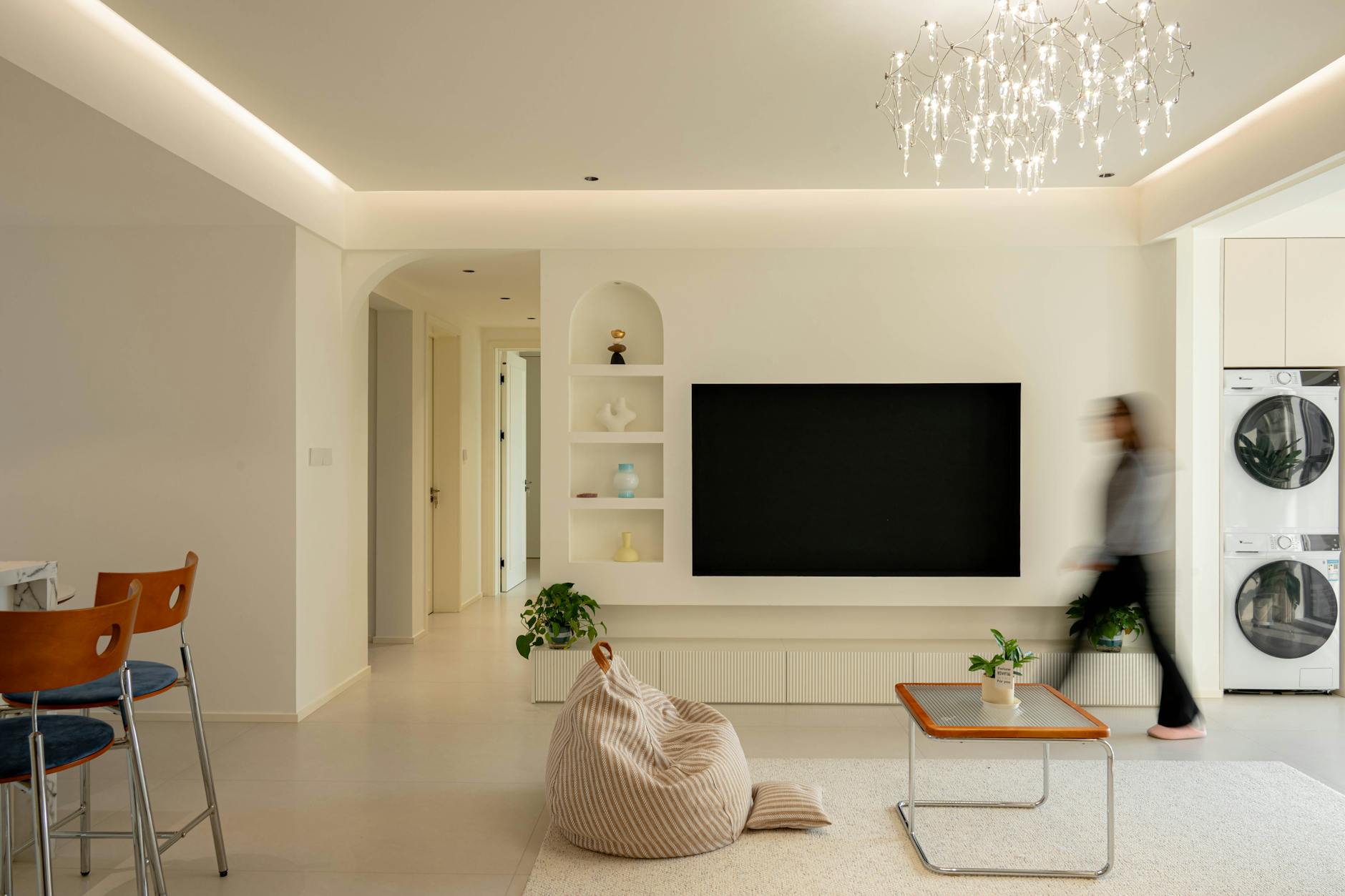 open-concept living room with plants