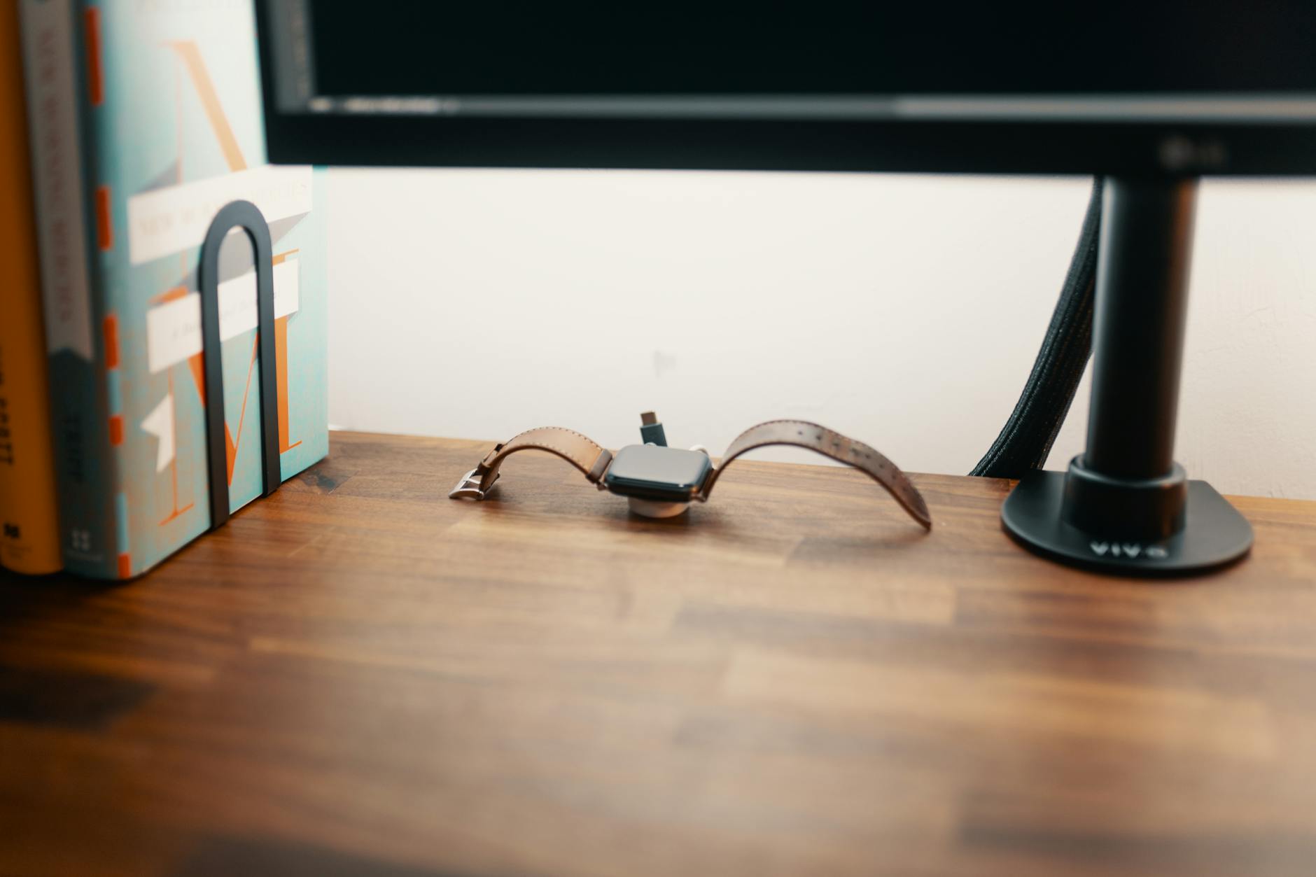 organized cables and electronics on a desk