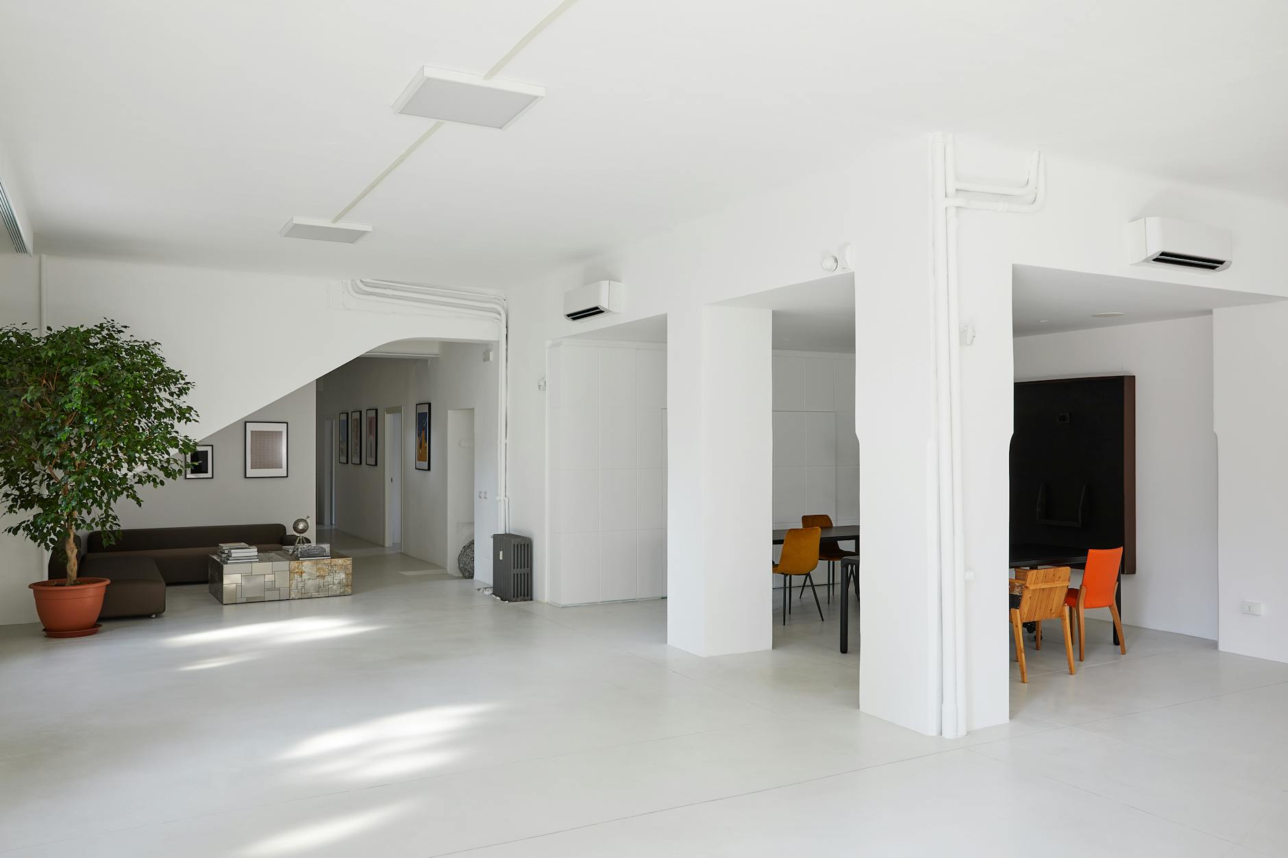 airy white living room design with natural light