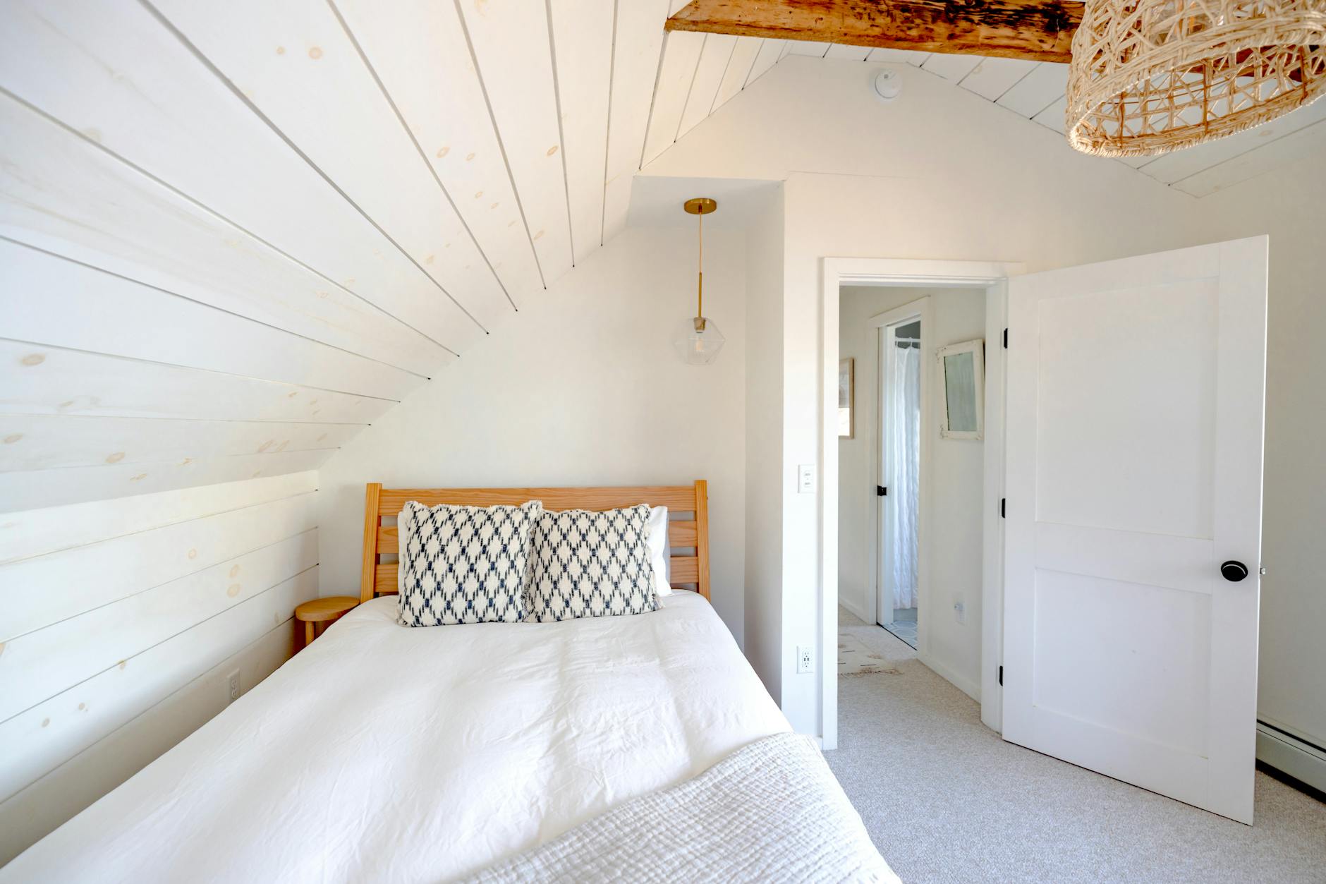 cozy white bedroom with natural textures