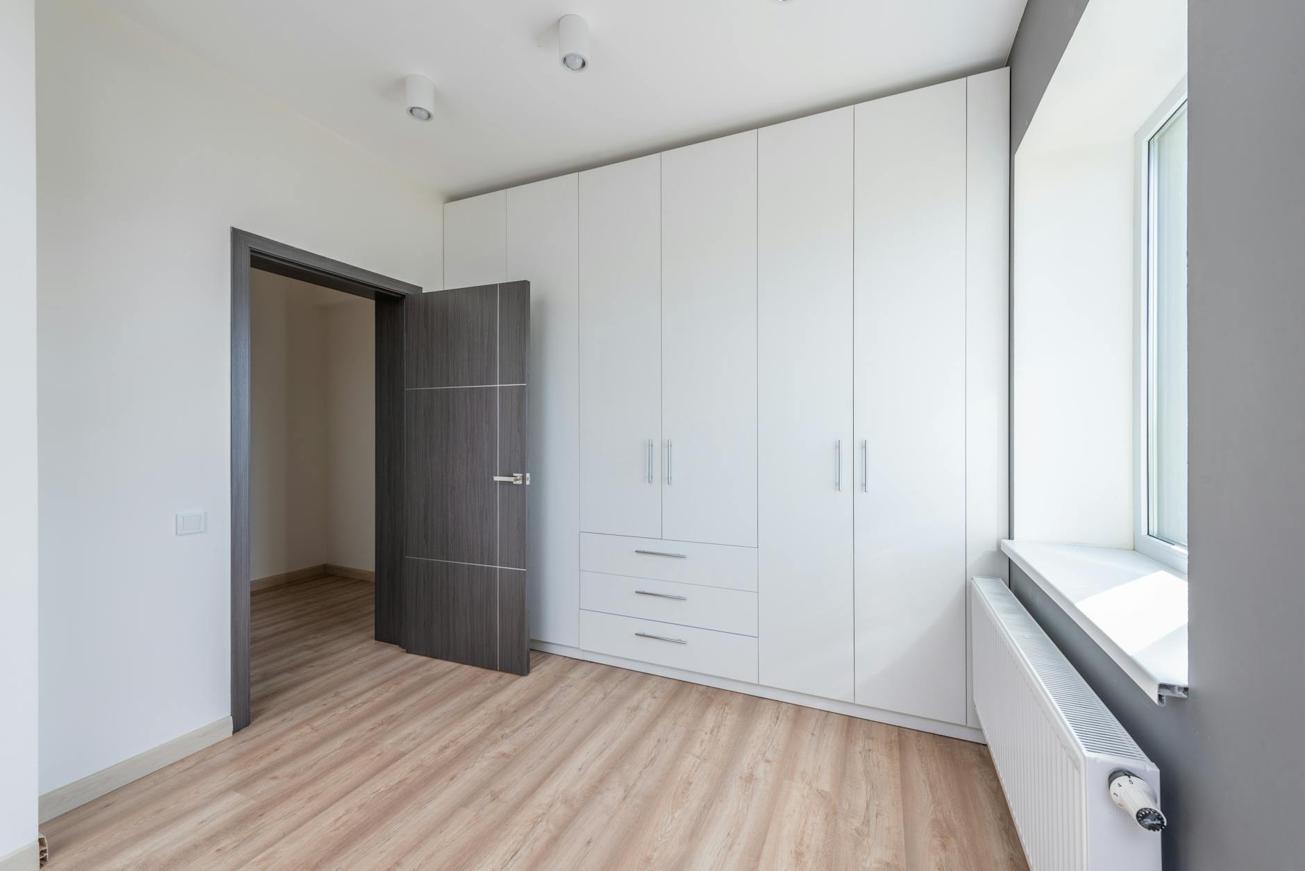 organized cleaning supplies storage cabinet