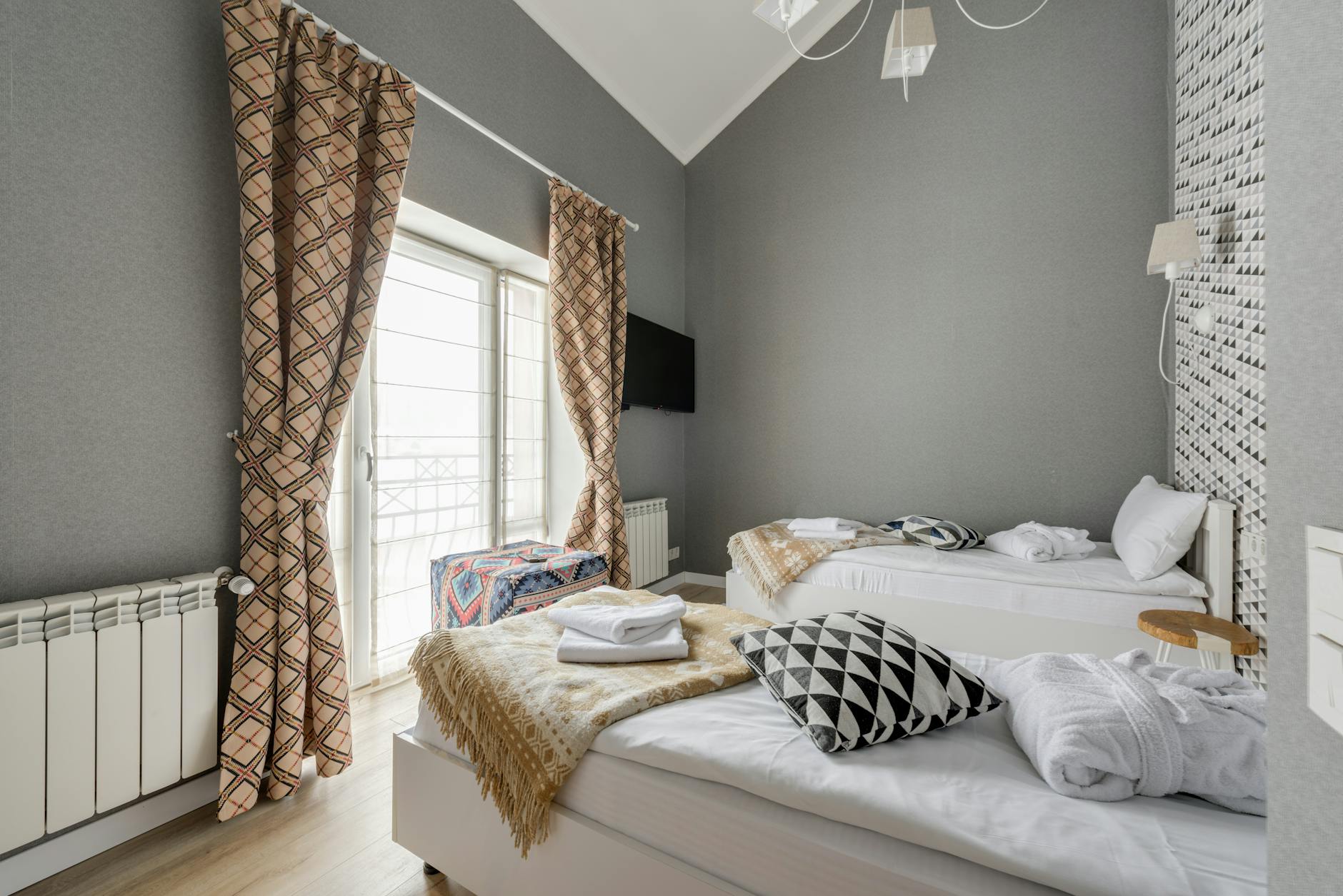 comfortable guest room design with bed and decor