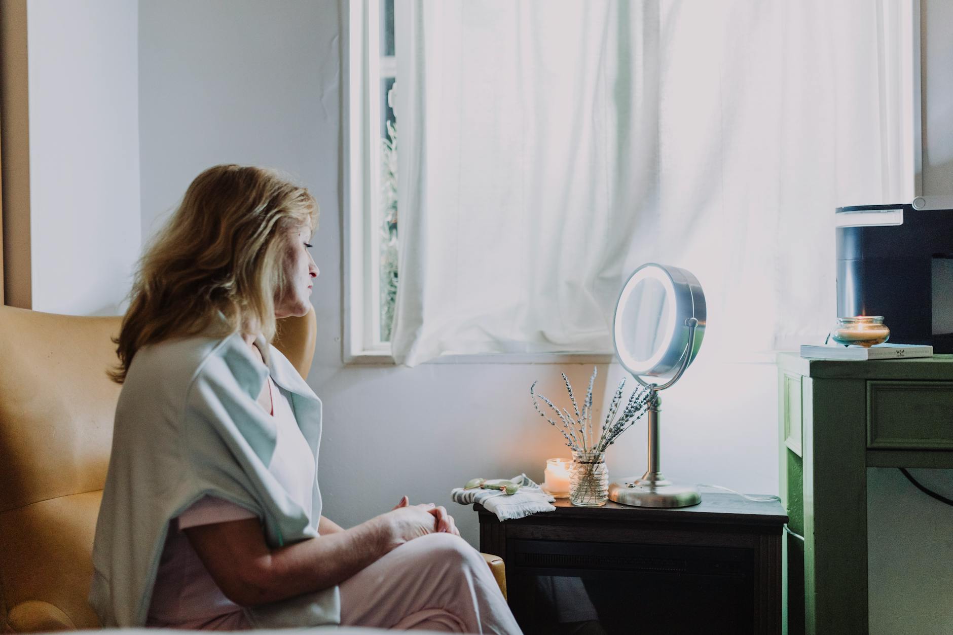 morning meditation with candle and soft lighting