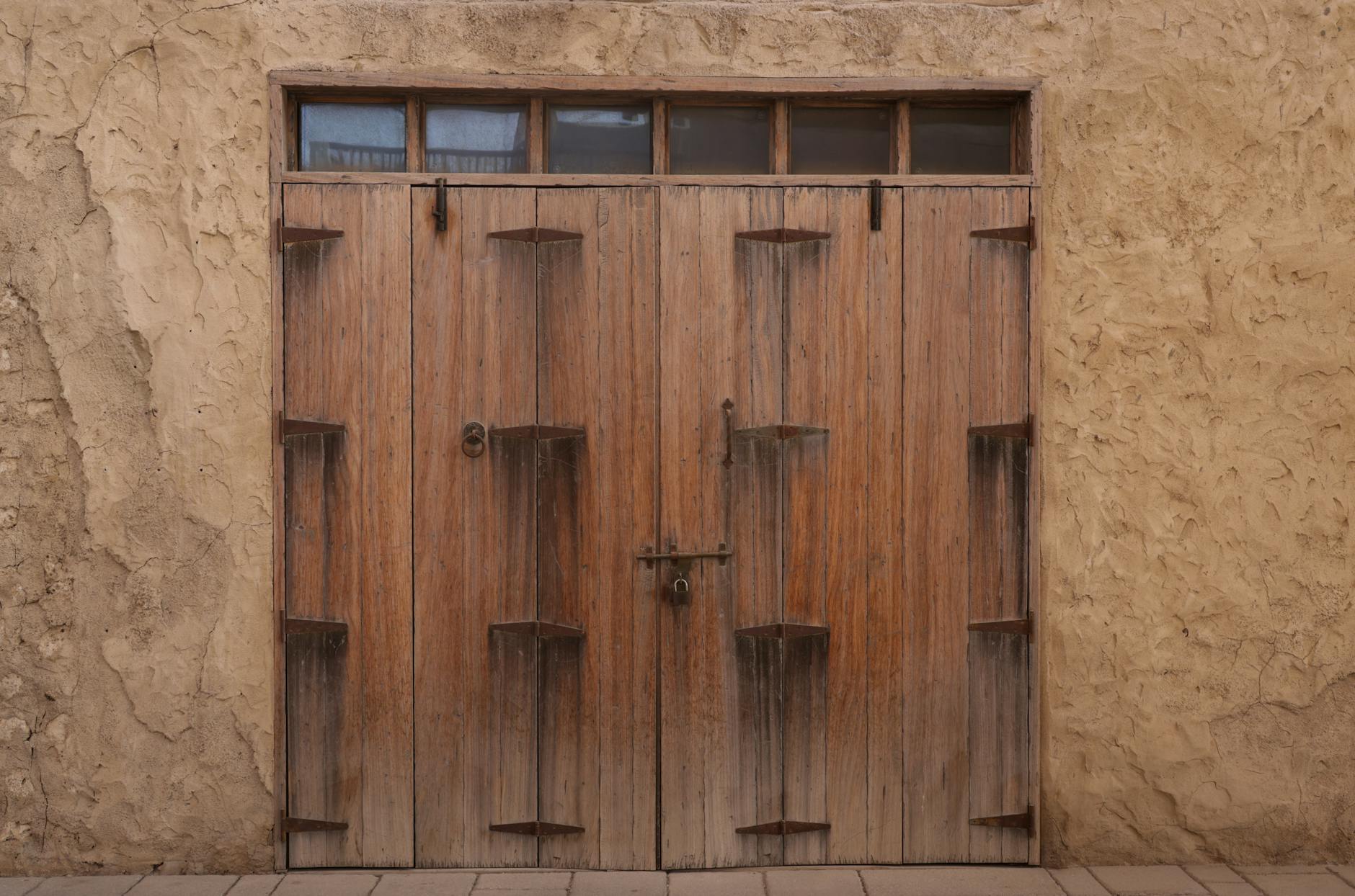 old wooden door in an alley, mysterious atmosphere