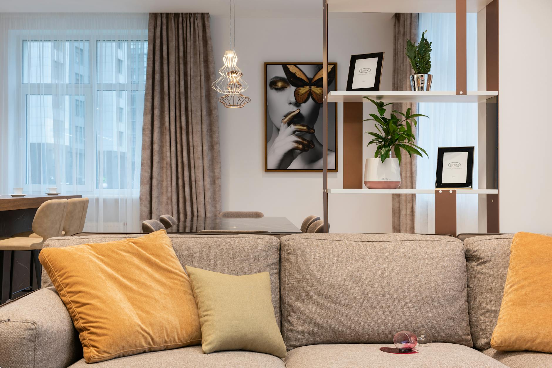 Personalized art and decor in a neutral living room