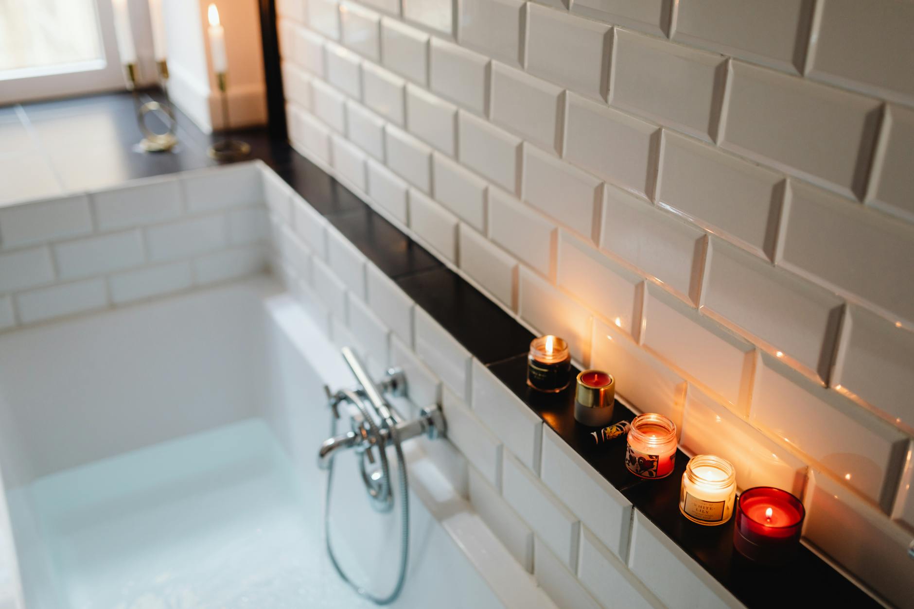 elegant bathroom design with candles and dim lighting