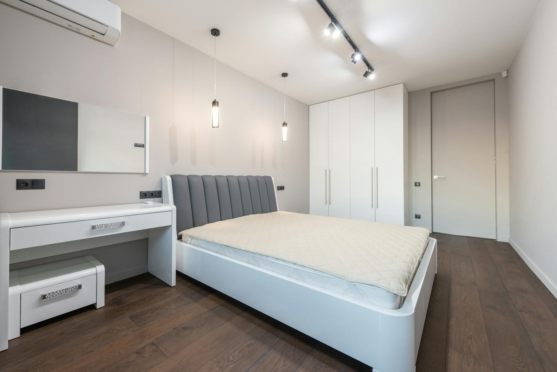 minimalistic bedroom with organized closet