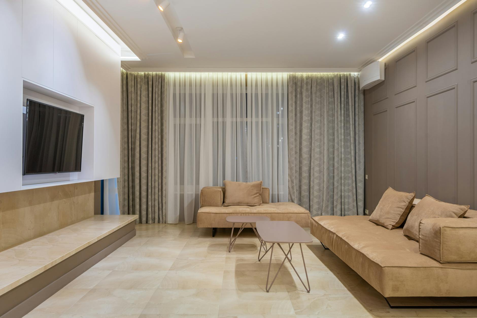 stylish furniture arrangement in a neutral color living room