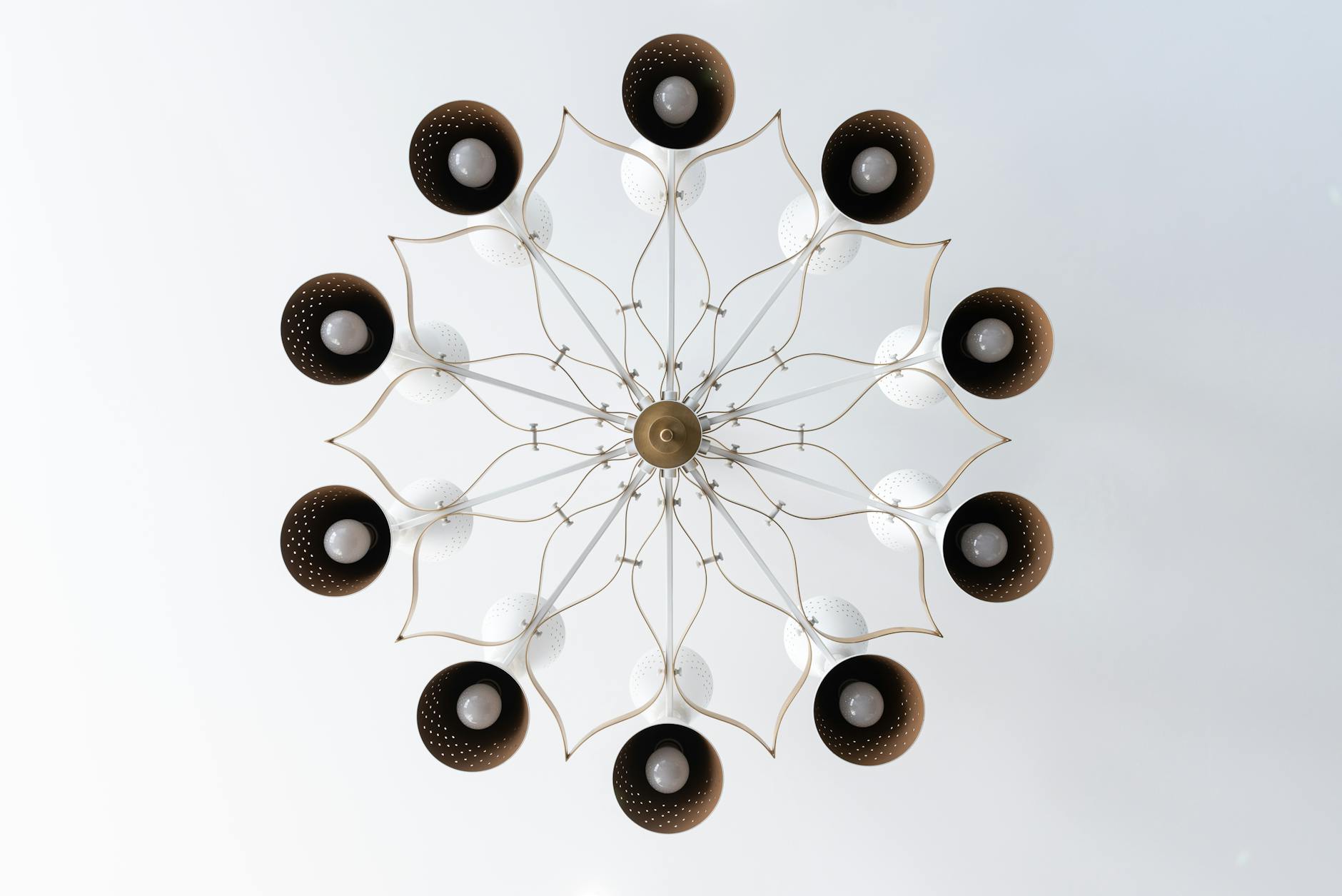 modern decor with unique lighting fixtures and soft color palette
