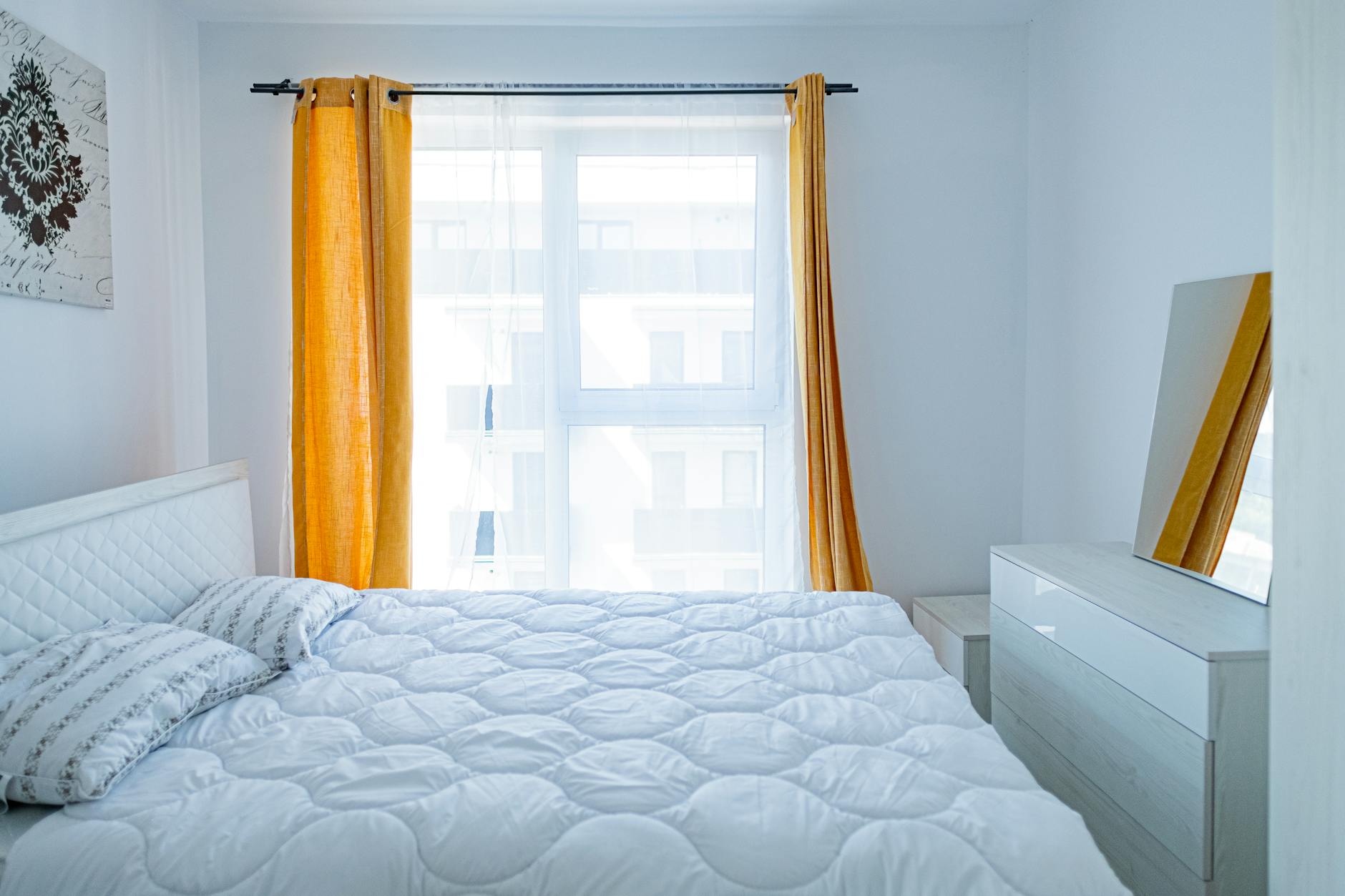 cozy bedroom with elegant textiles and minimalist decor