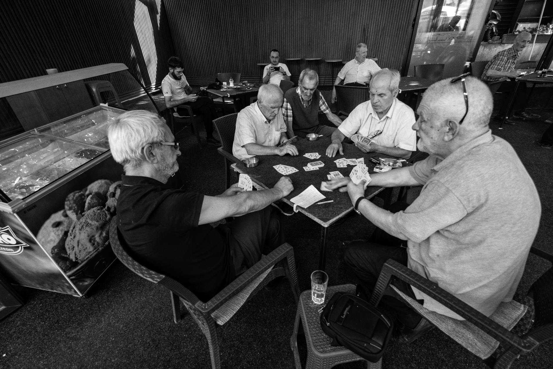 locals playing cards in Venice cafe