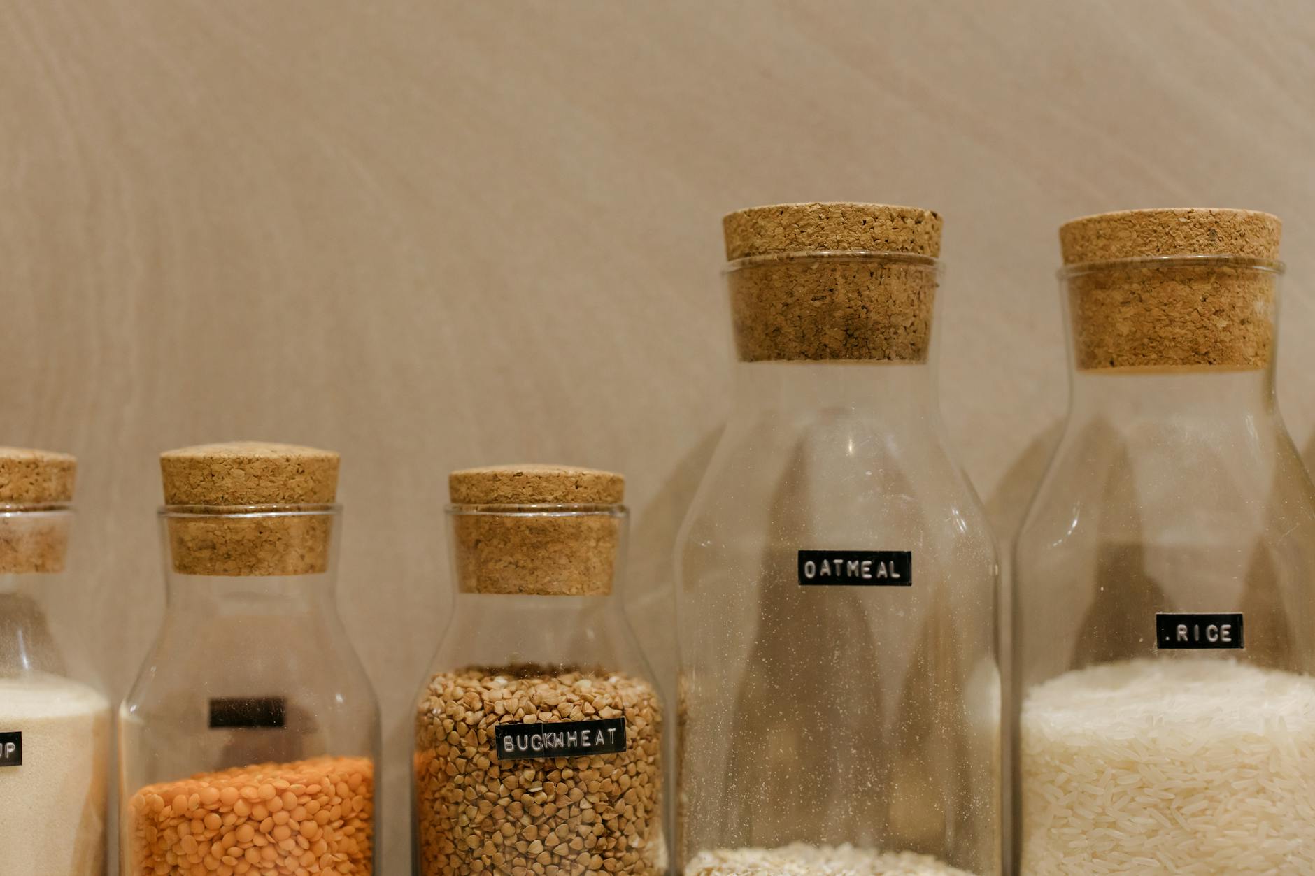 labeled storage bins in a pantry