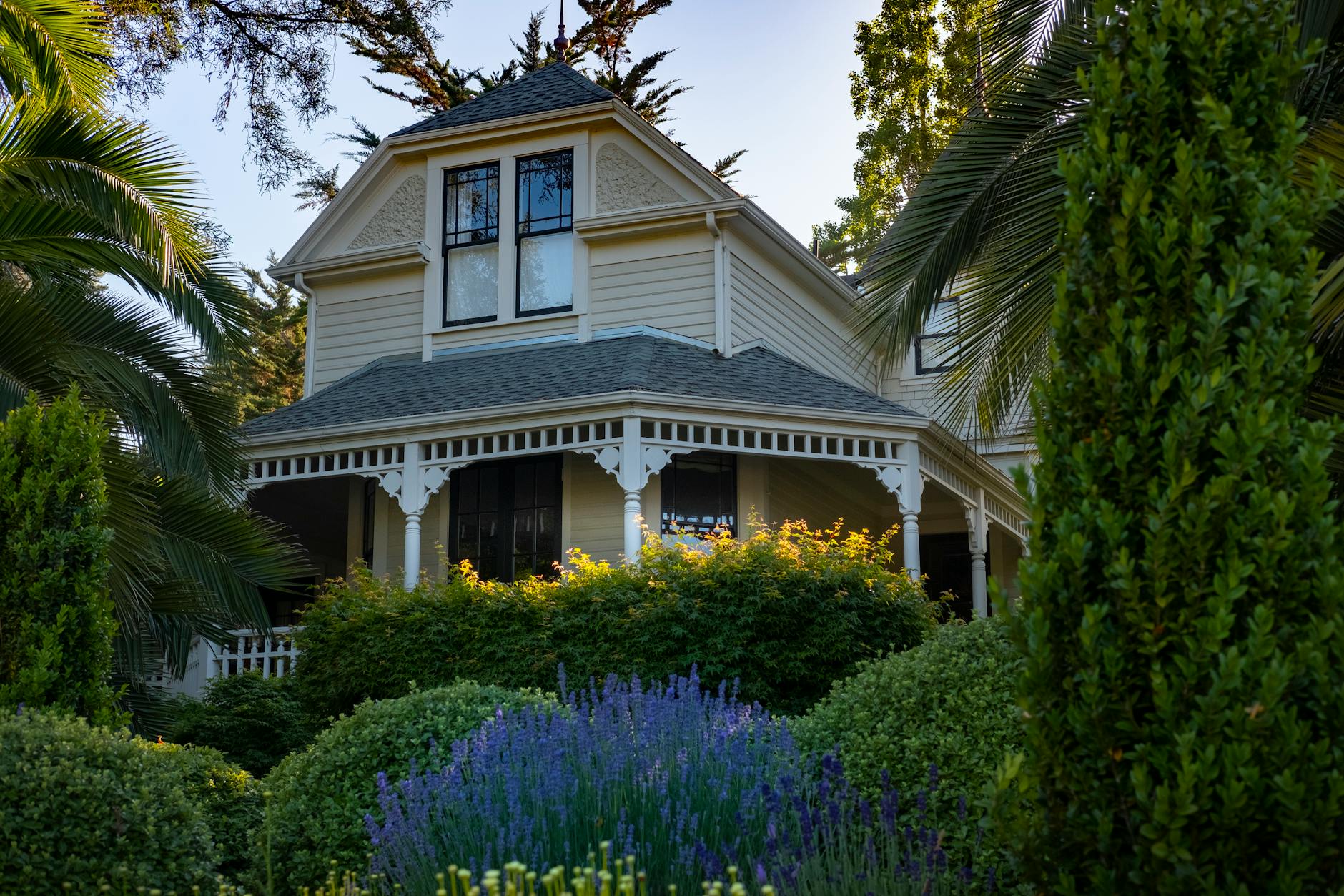 Victorian house exterior with flowers