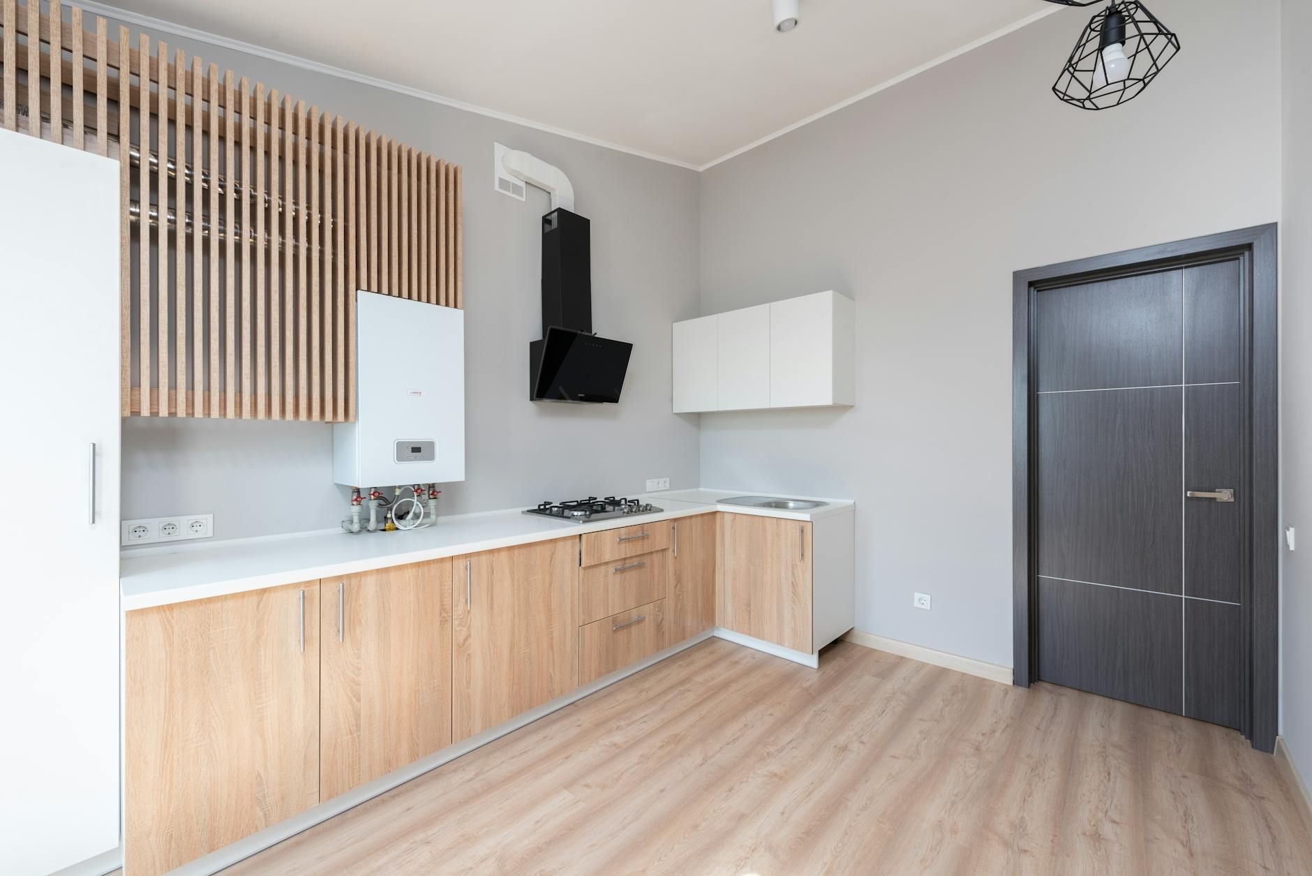Japandi kitchen with wooden cabinets and natural lighting