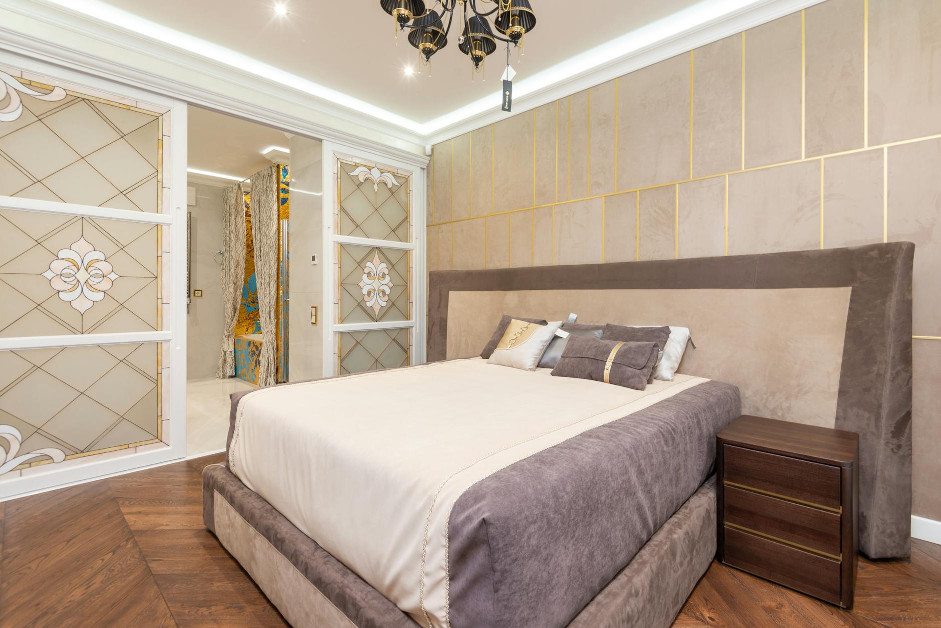 Japandi bedroom design with plush bedding and wooden accents