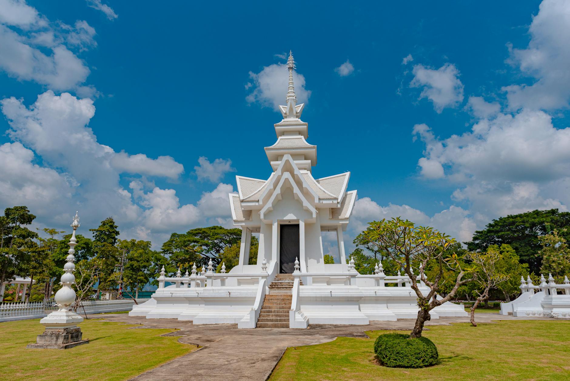 serene temple surrounded by lush greenery