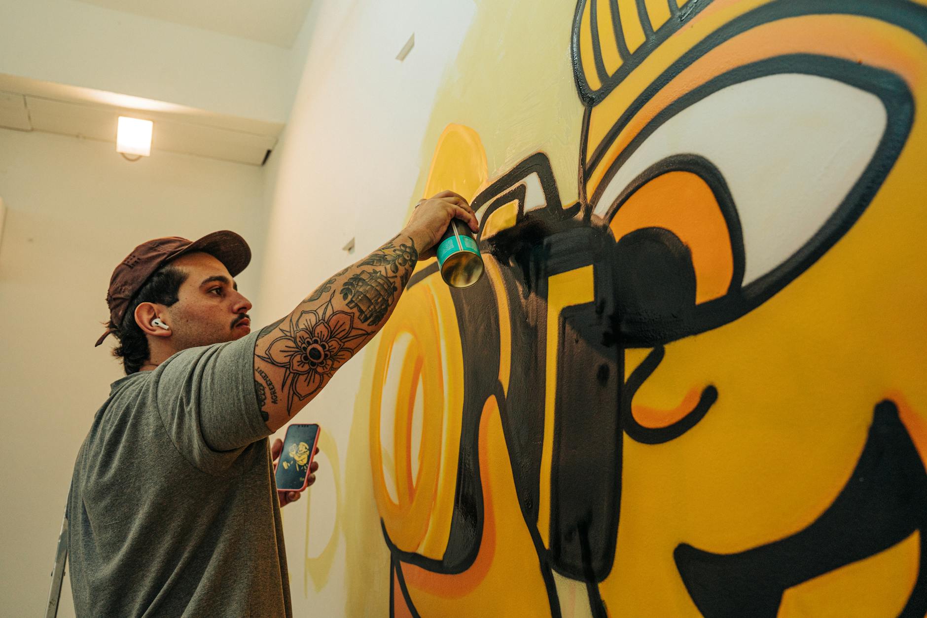 Artists painting vibrant murals